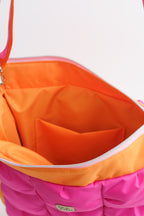Pufferbag in pink und orange innen