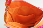 Pufferbag in pink und orange innen