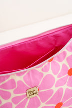 Innenansicht einer handgemachten Stofftasche für Damen mit pinkem Innenfutter, Reißverschluss und praktischem Innenfach.