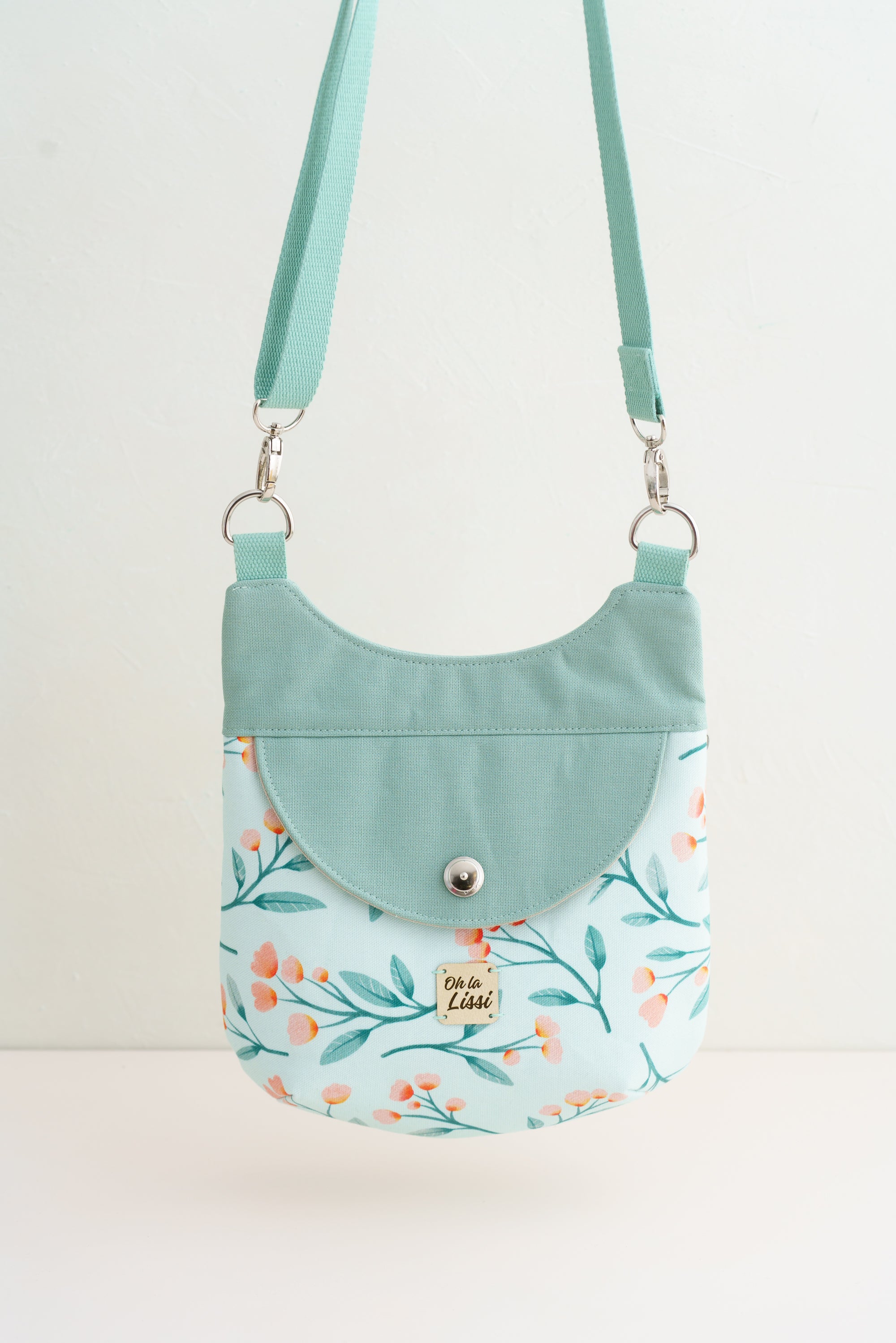 Crossbody Tasche mit Blütenmuster in Mint und rosa