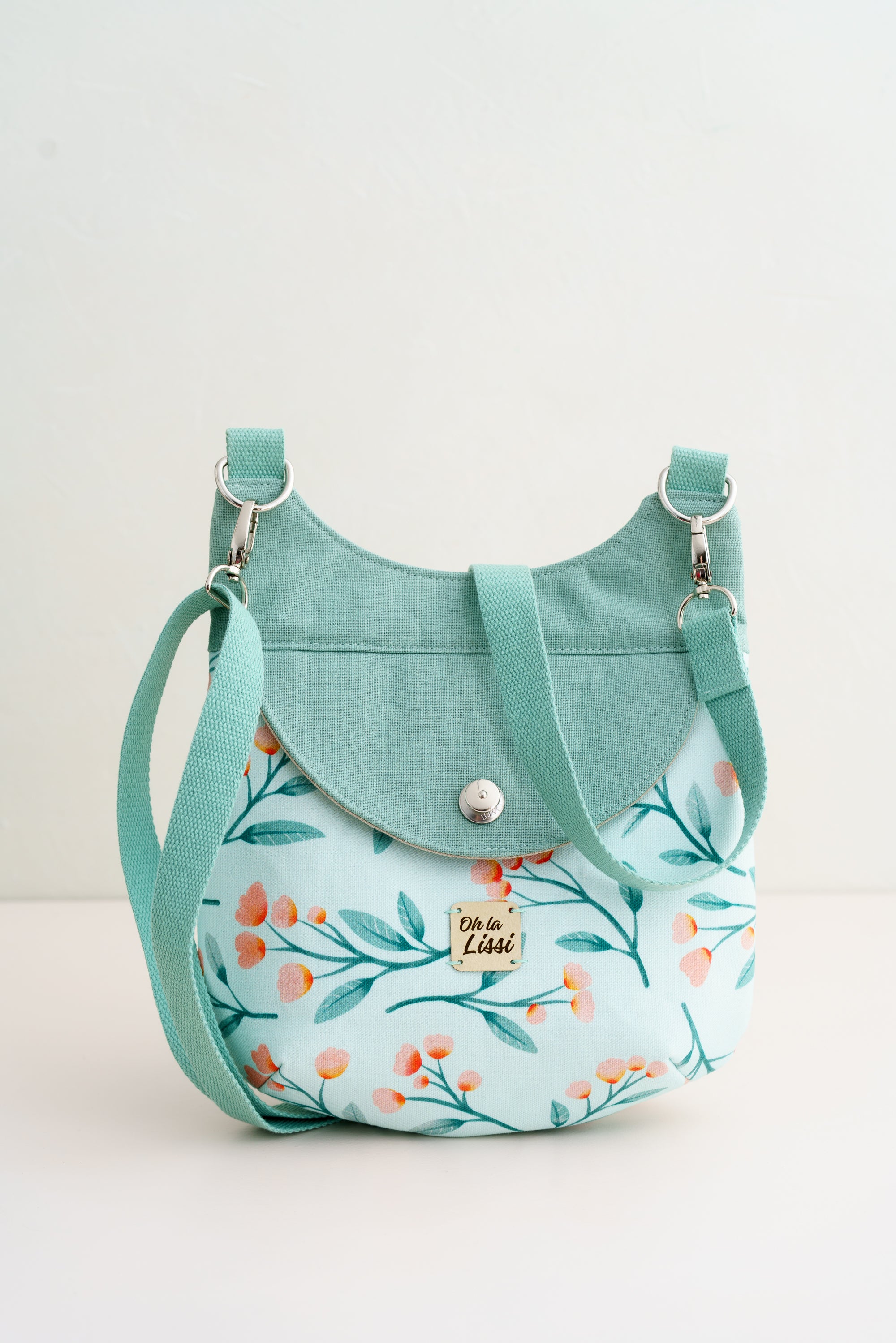 Crossbody Tasche mit Blütenmuster in Mint und rosa